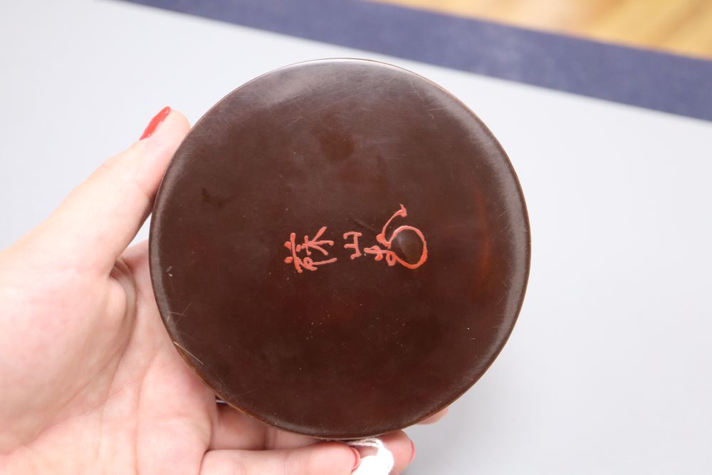 A Japanese mother of pearl inlaid lacquer box and cover